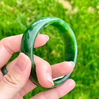 A CANADIAN JADE BANGLE 57MM #2379