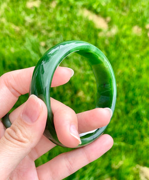 A CANADIAN JADE BANGLE 57MM #2379