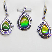 Ammolite Earrings And Pendant Set. Color changing from purple, to blue, green, yellow to gold. 