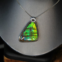 Whole piece of Canadian ammolite stone. Color changing from yellow, green, bluish green, to blue, high flash coloration. 